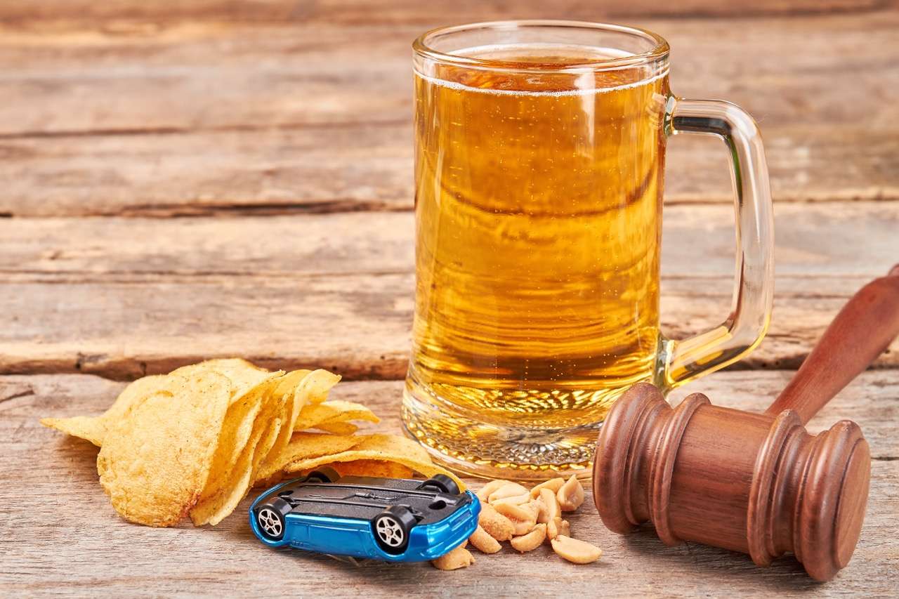 Beer, snacks, toy car, and a gavel